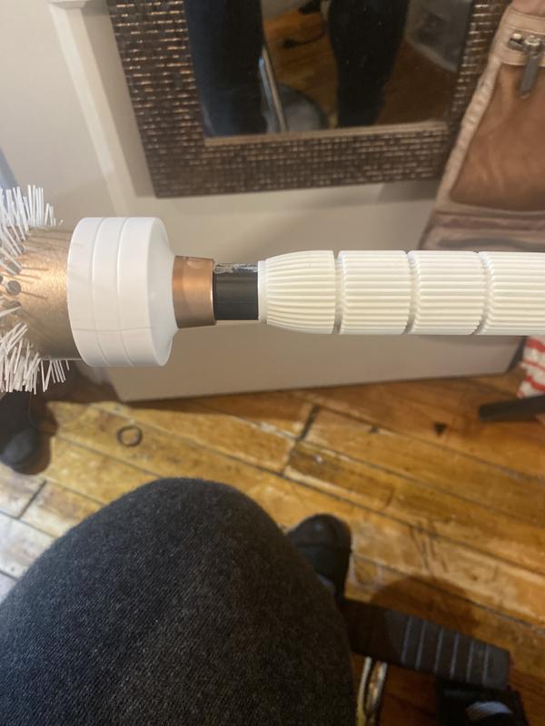 Handle cover dislodging from the brush