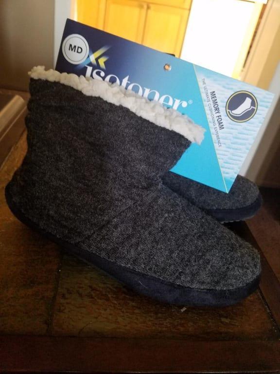 side view of the slipper boots in packaging