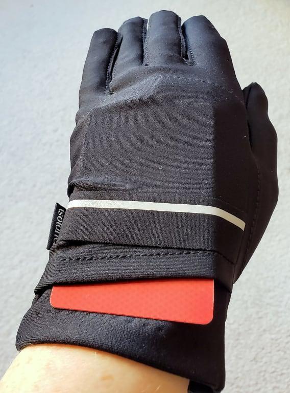 Glove with a card in the little pocket.