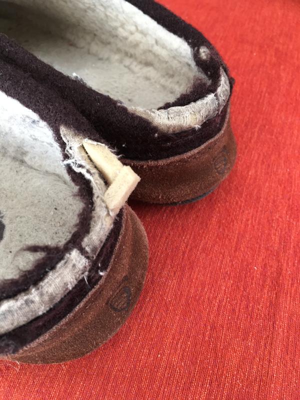 You can see the white lining fabric showing as the brown wool is almost gone