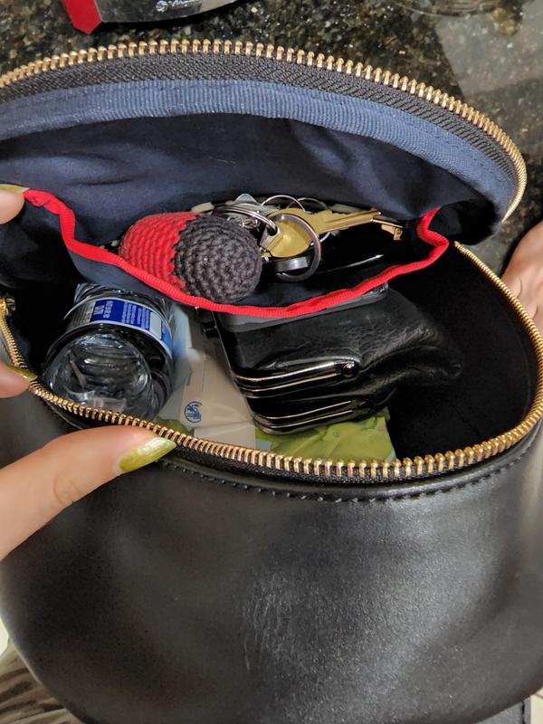 keys, water bottle, wallet, wipes, and sunglasses