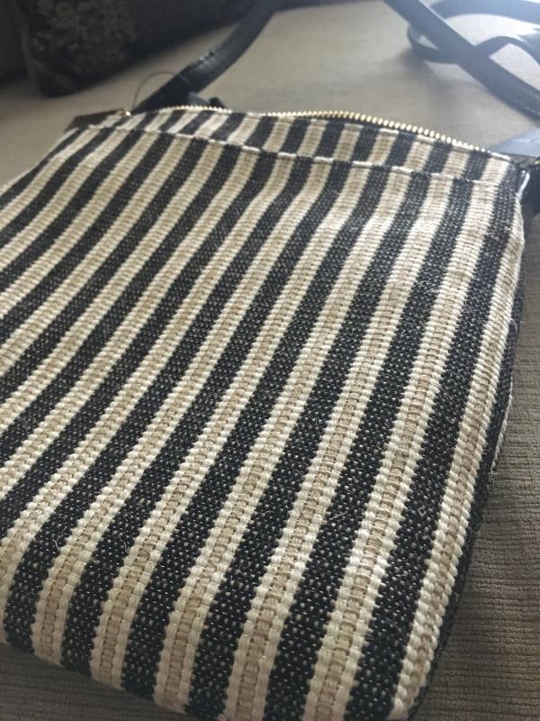 Some loose threads due to woven straw design