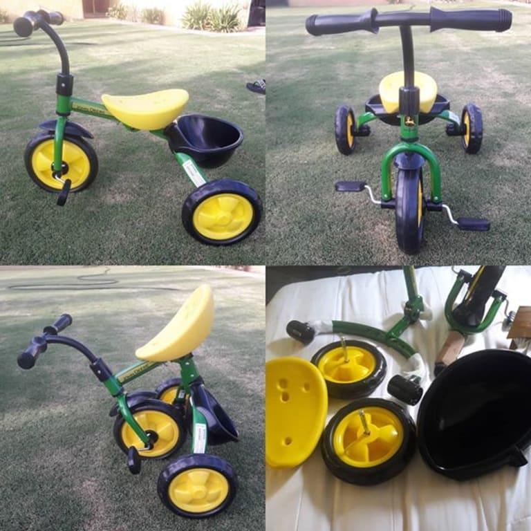 The John Deere Green Steel Tricycle was so easy and fast to assemble, it normally takes me a hour to put a tricycle together. This was our first tricycle from John Deere and it had some great features that I have not seen before, the seat was adjustable you could move it forward or backwards, also it folds up easy to save space when traveling. I did notice that the bucket in the back of the tricycle is plastic making it not very sturdy and wobbly not a lot of structure to hold your 2 year old that will want to climb in there, it would definitely break. Also The wheels are made plastic my opinion is that they won't last as long as rubber would. Over all the tricycle has a lot of great features , the color and design is amazing, no problems with it tipping when making turns, and my 2 year old grandbaby just loves to ride it! I would recommend buying. #viewpoints #viewpointssampling #powerreviews #trybeforeyoubuy #GotItFree #producttester #productreview #review #reviewer #johndeere #tricycle #kidsloveit