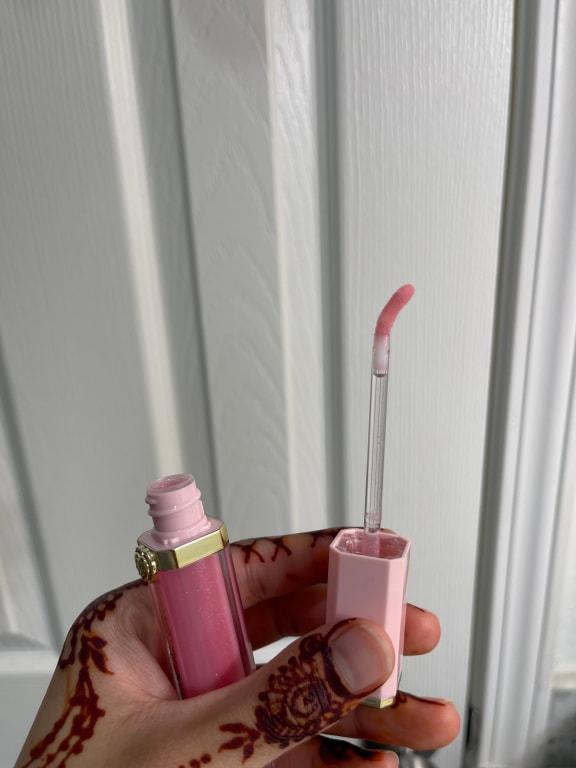 The gloss is so pretty on my lips and the plumping is perfect i've used this lipgloss all through high school but the packaging changed and it isn't the same anymore