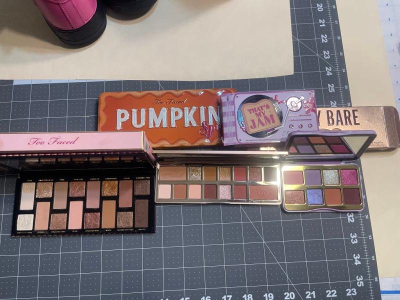 The pan size is smaller than the mini pans... but she's cute!!! Throw her in your pocket and rock it!!