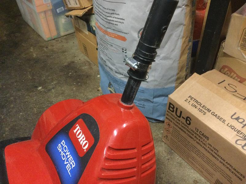 Broken Handel fixed with hose clamp