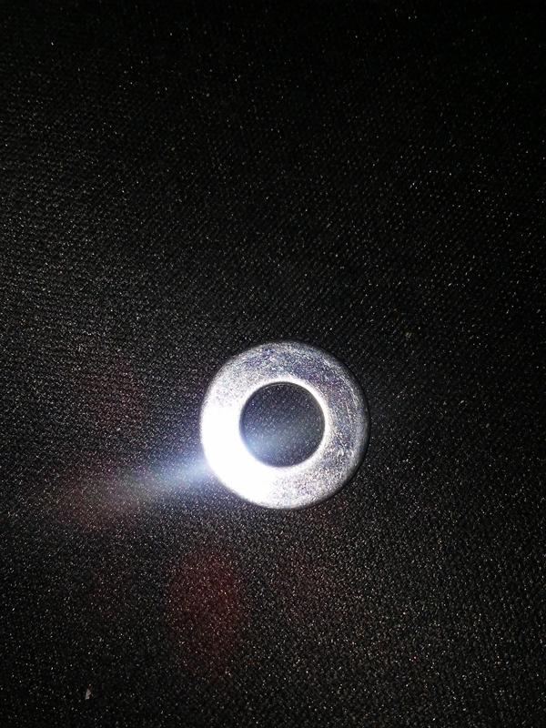 Flow reduction washer