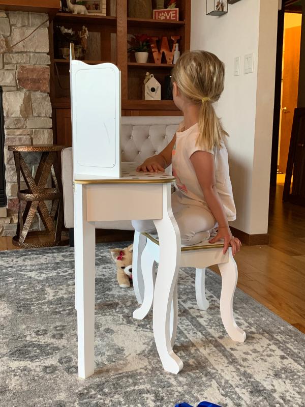 My 5 year old sitting at vanity