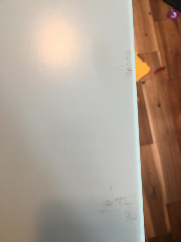 Scraped and chipped top