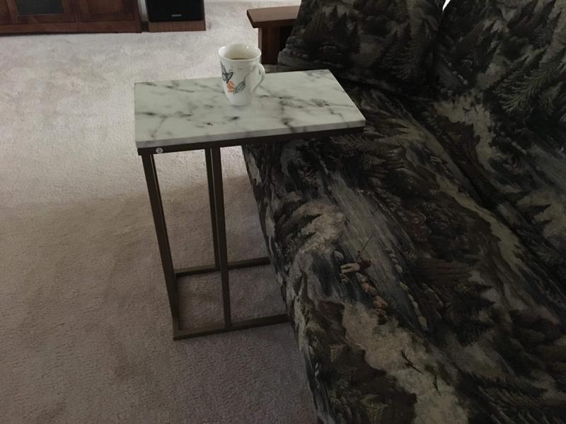 Perfect height when you are sitting and want to put a cup down within reach.