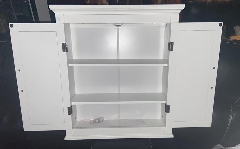 Cabinet open with three levels and two removable shelves