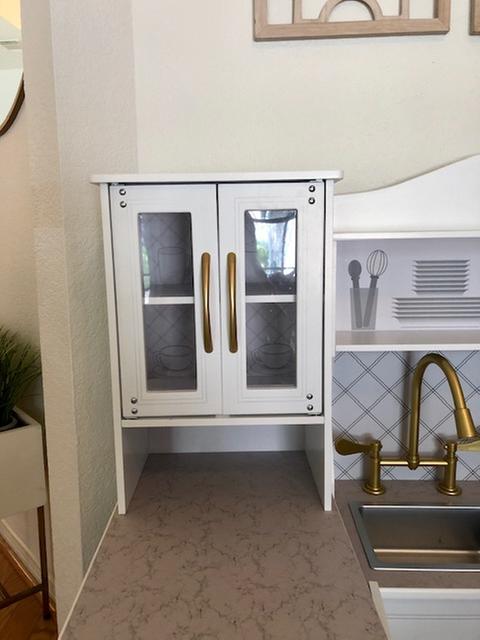 Close-up of cabinet over countertop