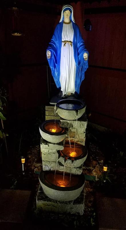 Water fountain with Our Lady Mother Mary.