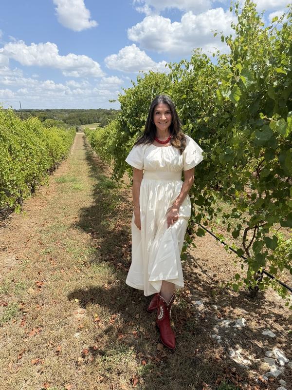 Customer photo for "My crimson Jolene Tecovas are stylish with a po..."