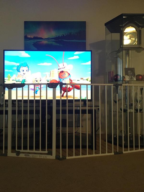 Blocking her off from my galss cabinet and TV