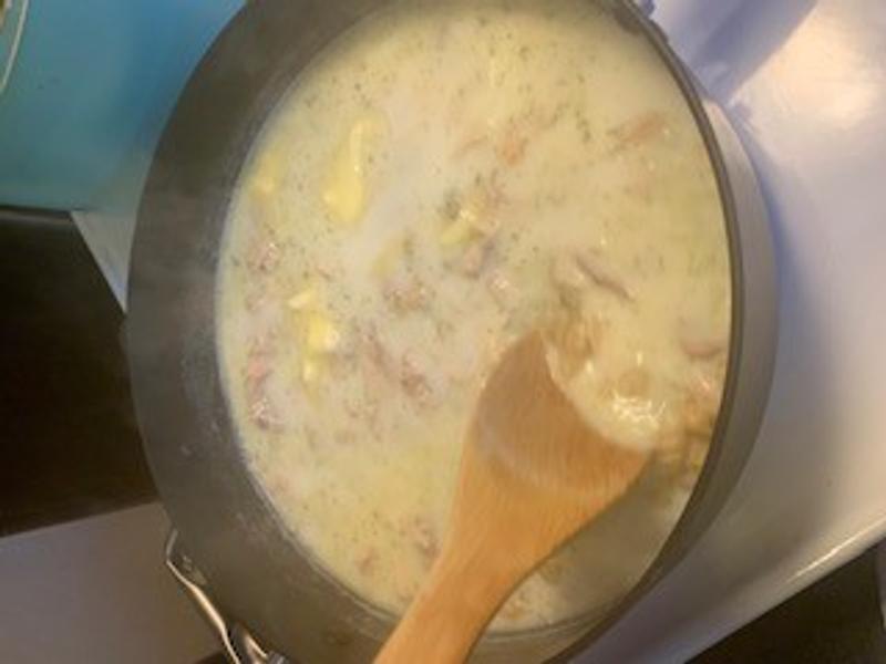casserole being stirred