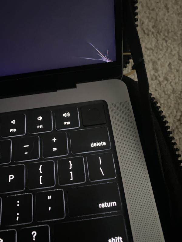 Bezel of Macbook Pro cracked.