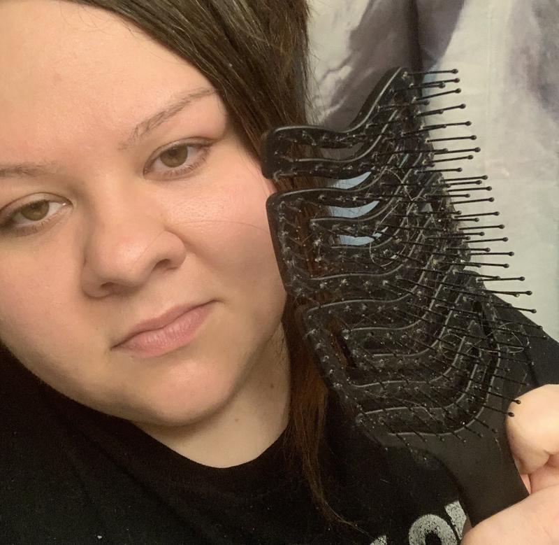 Normally brushes rip out my hair, but you can see how little is in there after thoroughly brushing