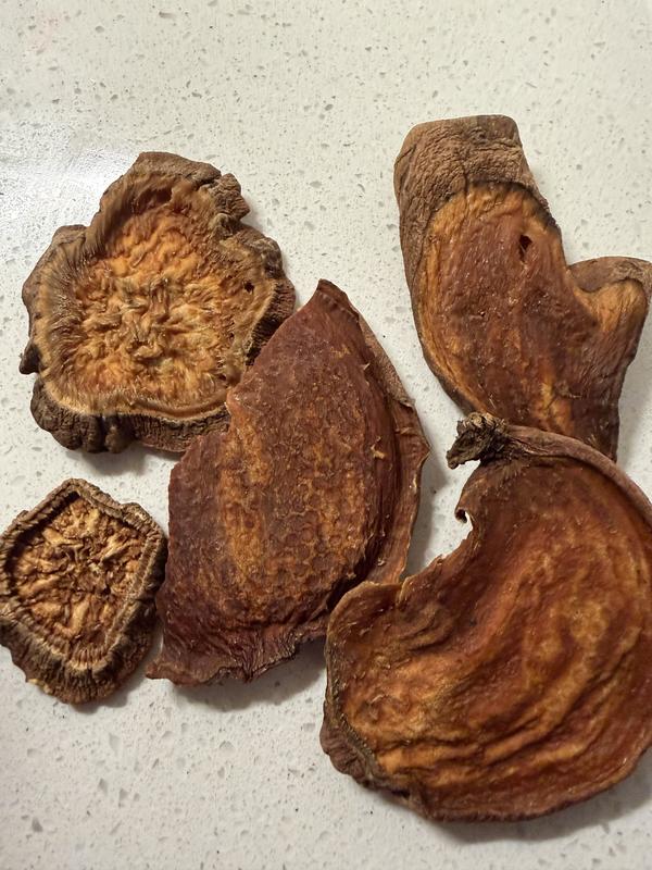 Burnt and dried. Not like the picture on the bag.