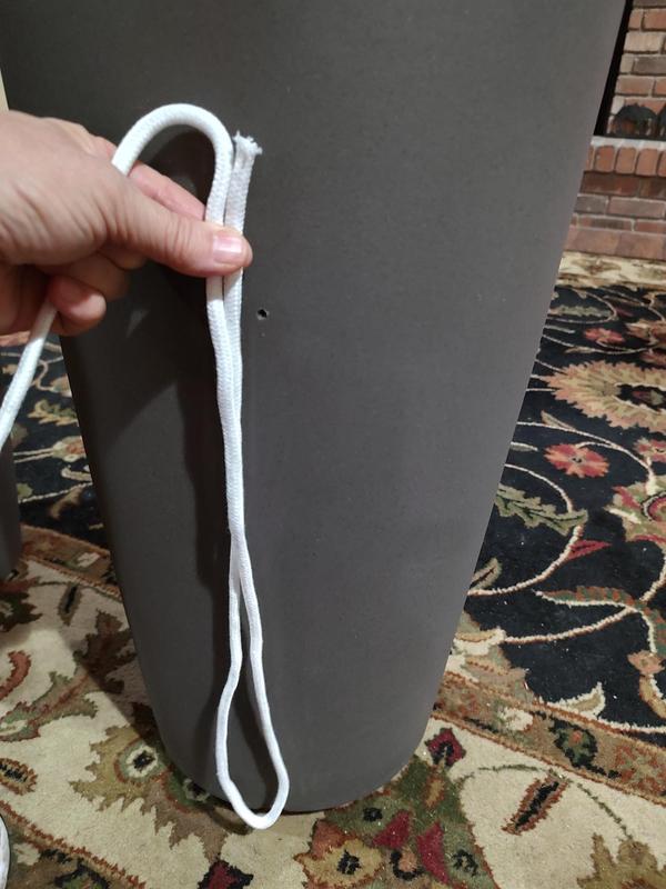 Each wicking chord cut to a length of 2" above the outer drilled hole.