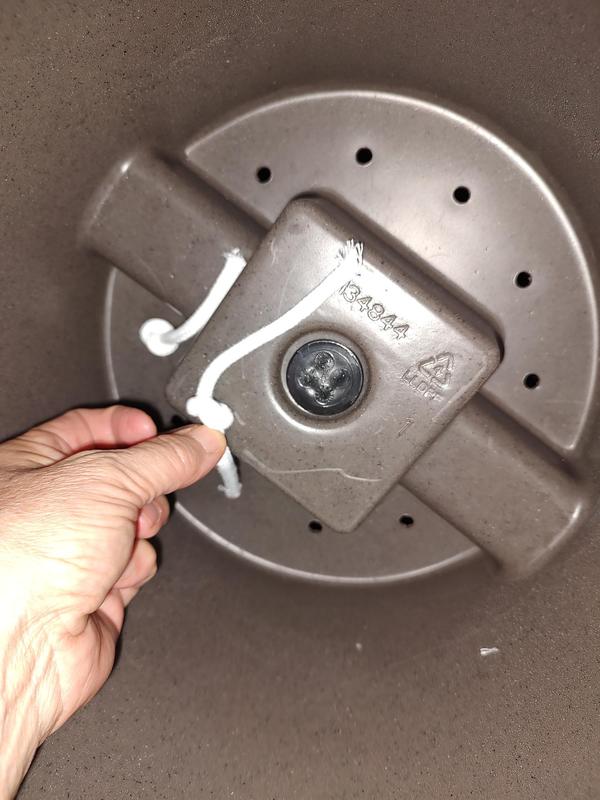 Loose knots hold each wicking chord, leaving 3" above the upper planter base.