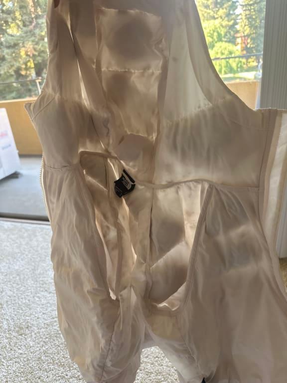 Customer photo for "One wash, the down fill formed like a cotton ball in the cor"