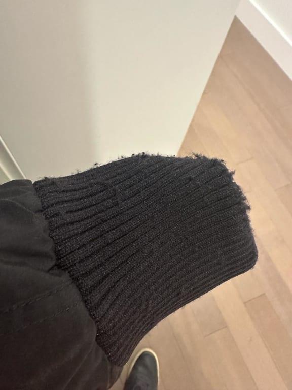 Customer photo for "Warm, well-fitting jacket but poor quality cuffs"
