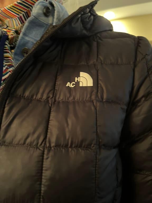 Customer photo for "Not sure if I would buy any more products with iron on decal"