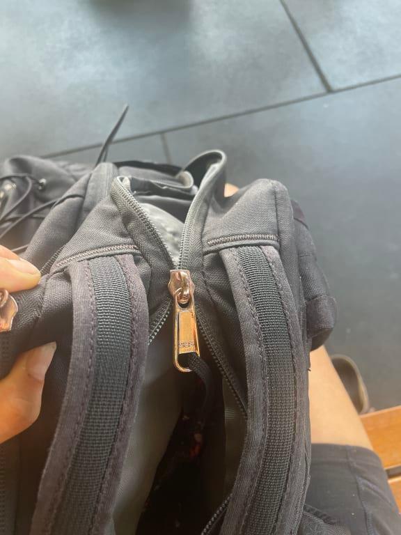 Customer photo for "Terrible quality - zipper broke"