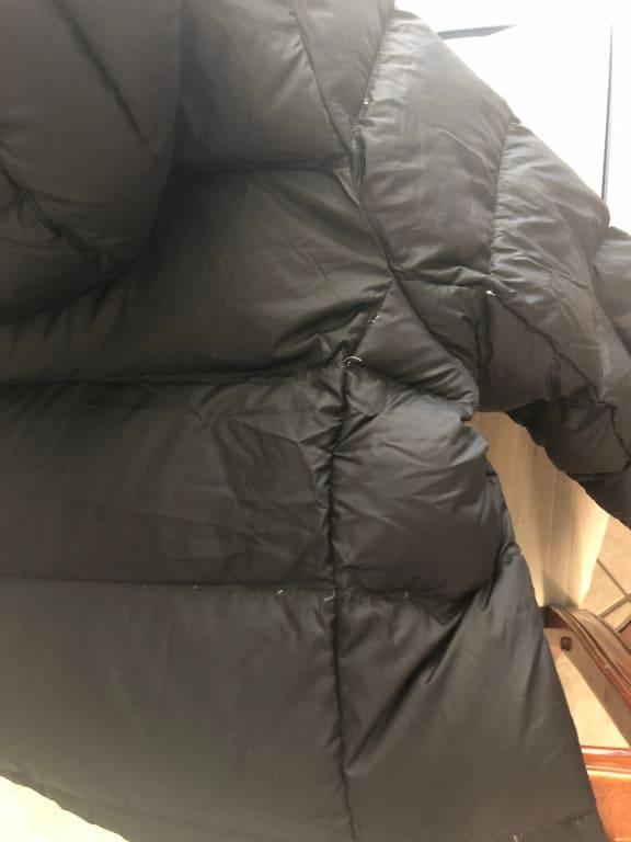 Customer photo for "Down feather come out all the time!"