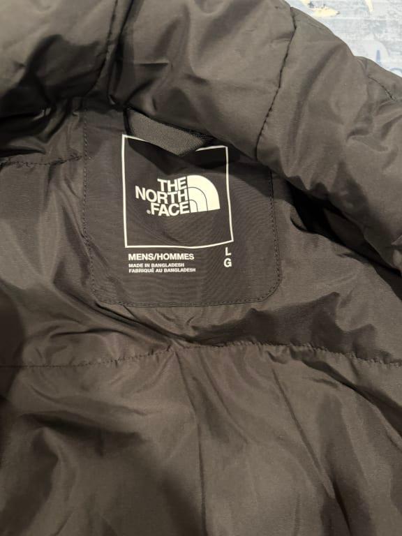 Customer photo for "I would not buy this coat again."