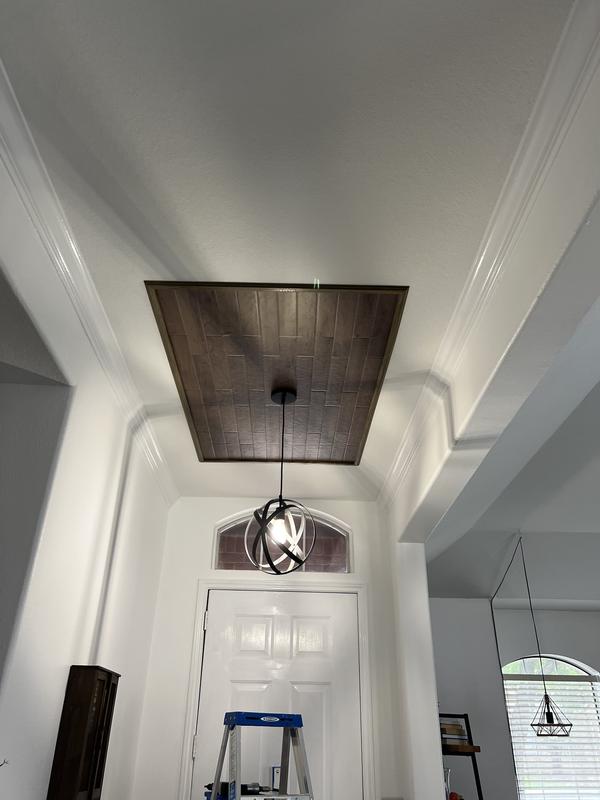 Process for putting up ceiling tiles.