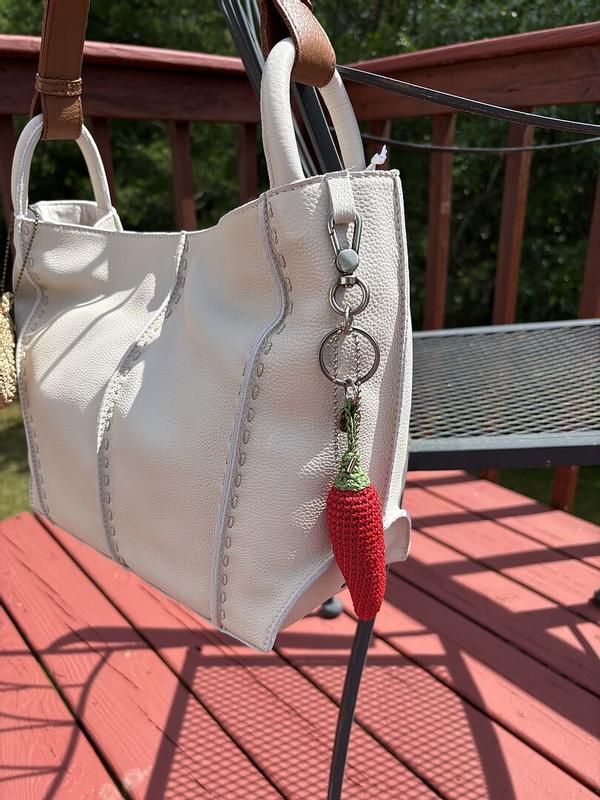 Customer photo for "The chilli pepper charm is"