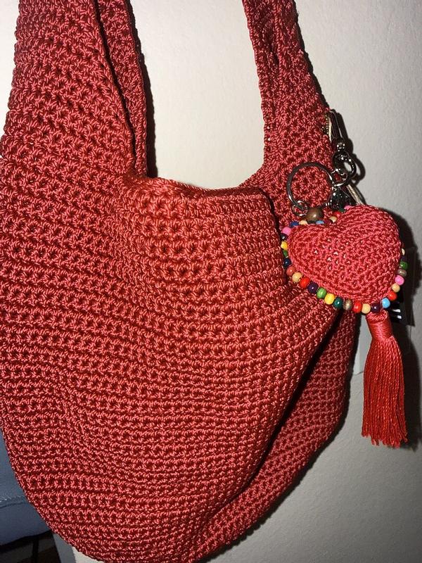 Customer photo for "This red crochet charm is"