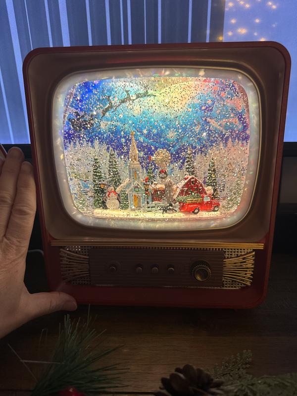 Festive Musical Christmas Village TV Decoration