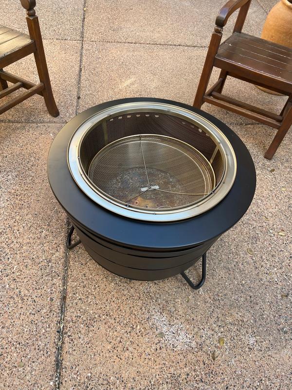 The screen and deflector nest inside the fire pit when not in use.