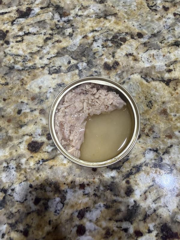 One of many freshly opened cans