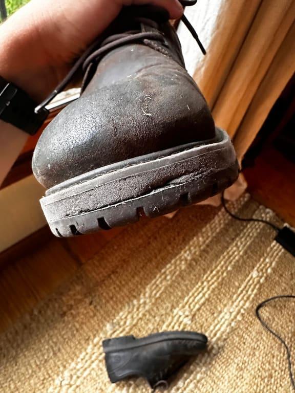 Customer photo for "Two months of wear and the sole is coming apart."