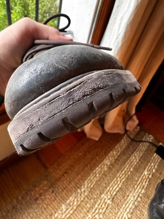 Customer photo for "Two months of wear and the sole is coming apart."