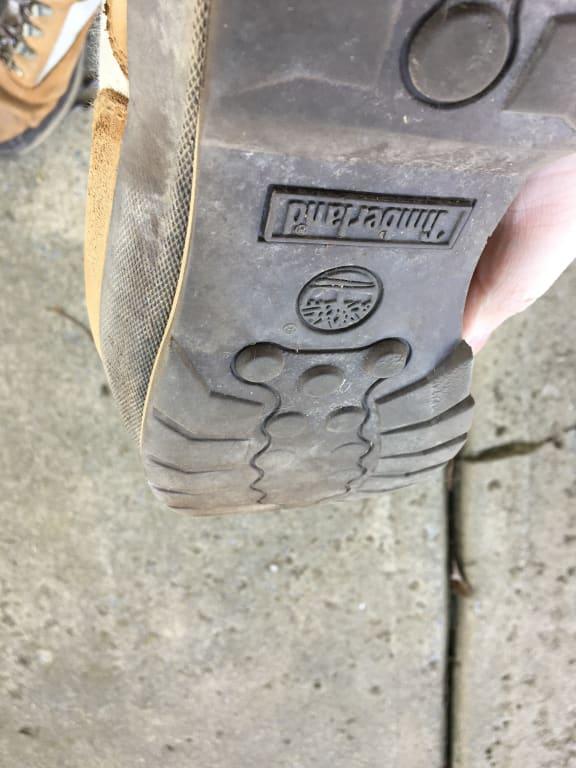Tread or "lugs" worn practically smooth
