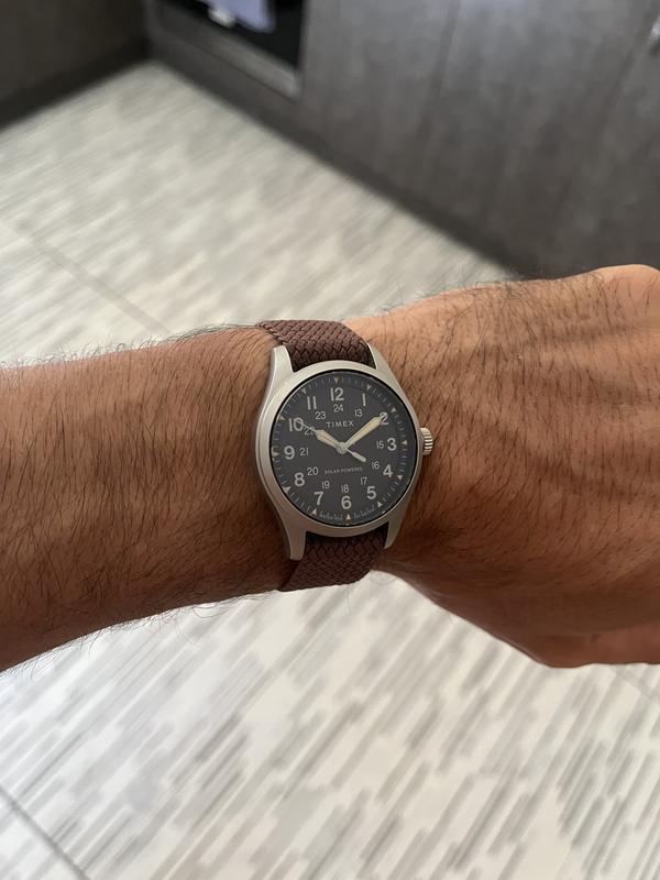 On a brown person strap