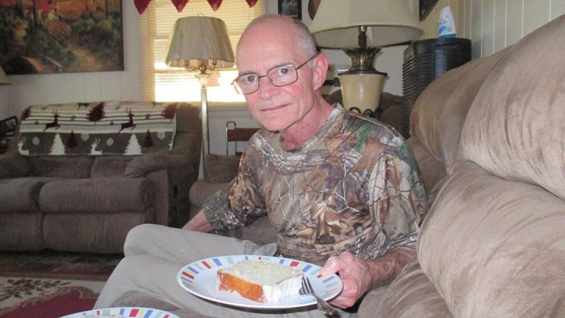 My husband getting ready to test out the cake made in our Loaf Pan