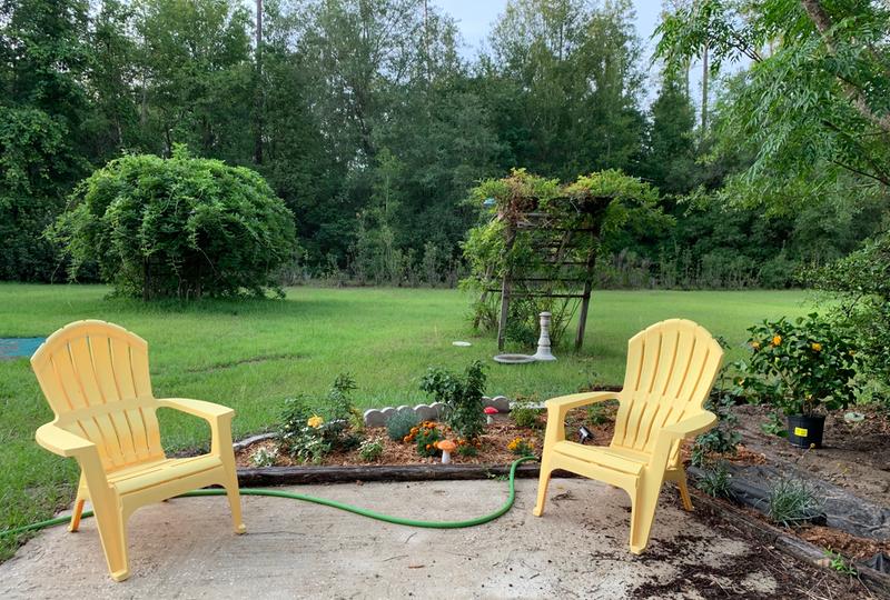 Bright yellow best sale plastic adirondack chairs