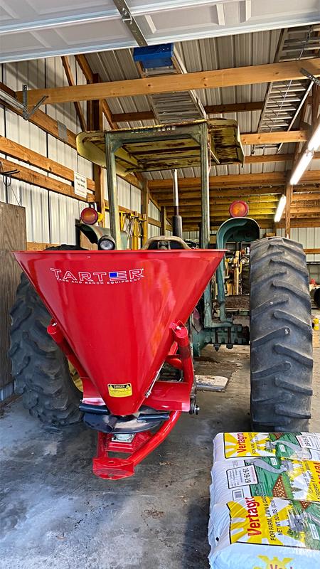 Spreader attached to the old John Deere.