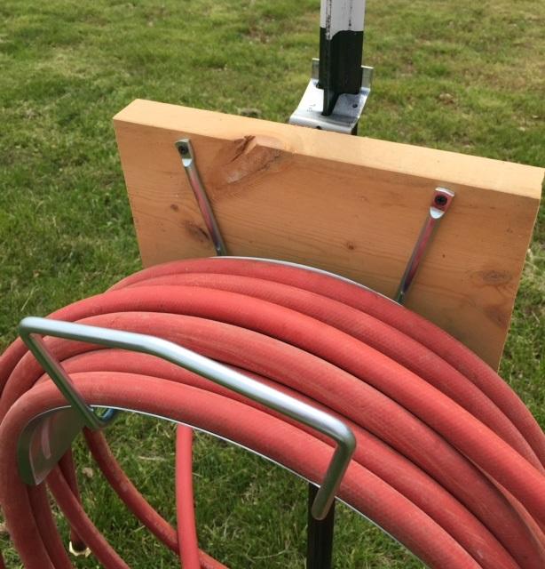 Hung my water hose to a t-post with ease!!!