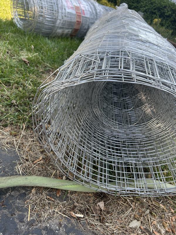 Bent and crushed rolls of wire make it difficult to get a straight and neat fence