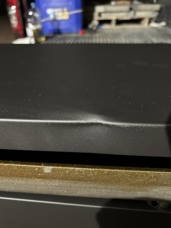 Dented hood
