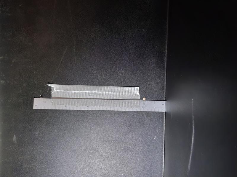 Shelf holes all measure 2" and 113/8"