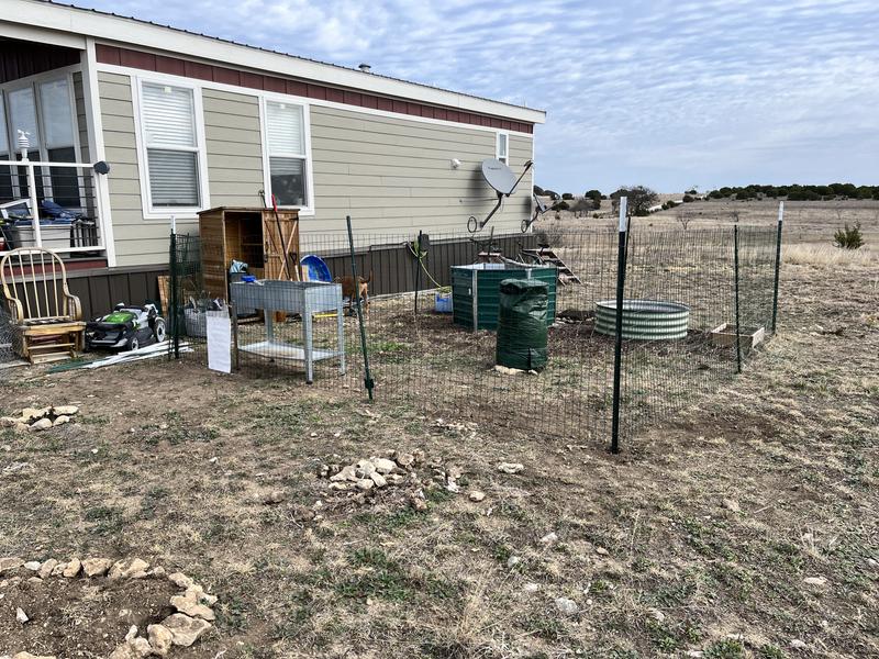 Raised bed garden with fencing around