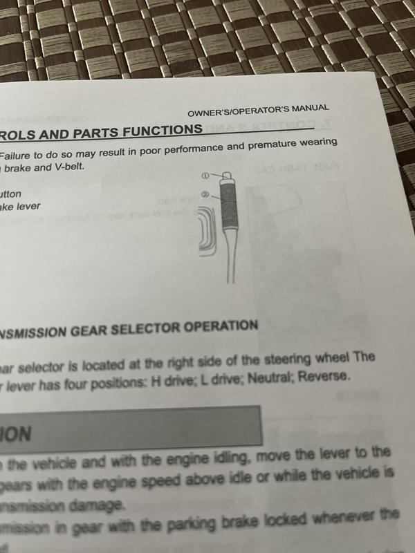 Two photos of the brake release and one showing the correct installation from the user manual.